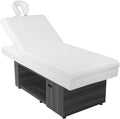 Vela Lash Bar adjustable spa bed for estheticians with white cushioning and dark wood base