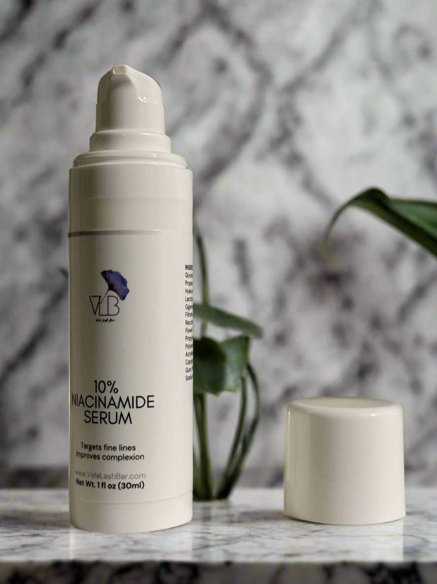 Vela Lash Bar anti-aging niacinamide serum in a sleek pump bottle for skin improvement and fine lines reduction