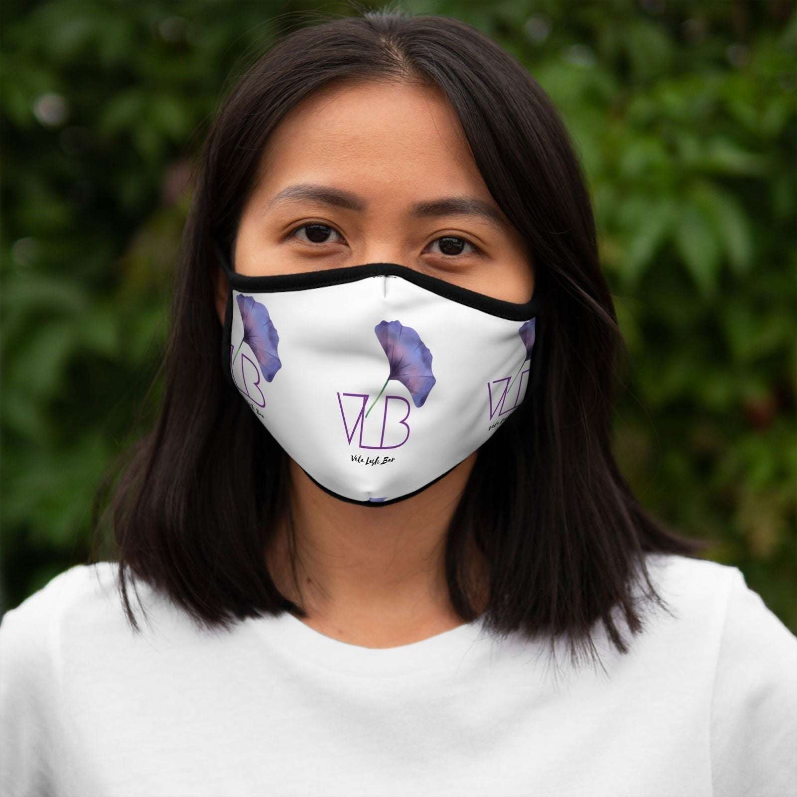 Vela Lash Bar comfortable face mask for beauty with white fabric and purple logo design