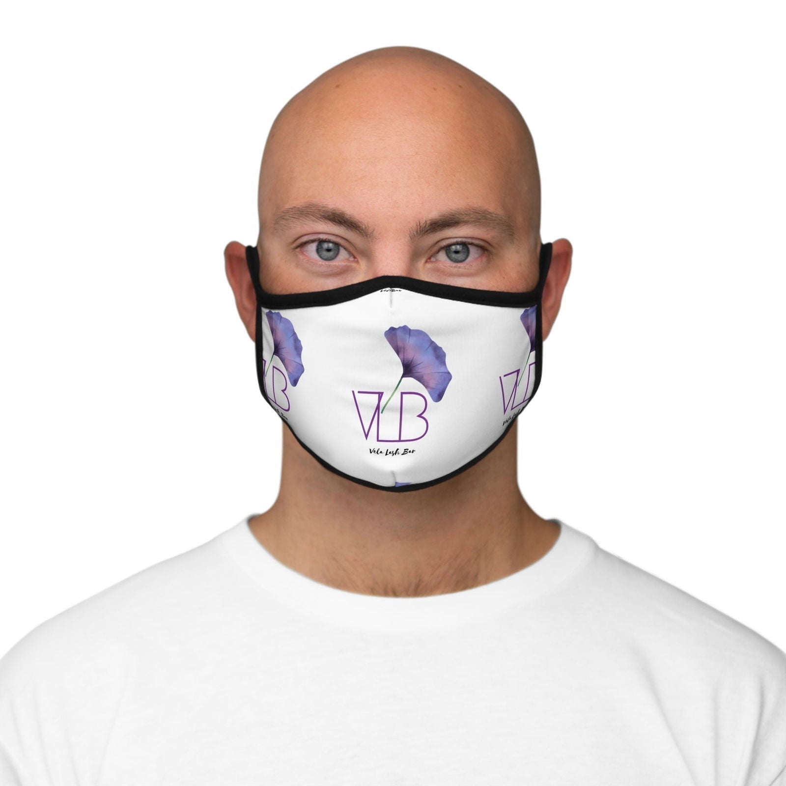 Vela Lash Bar comfortable face mask for beauty with purple floral design worn by man