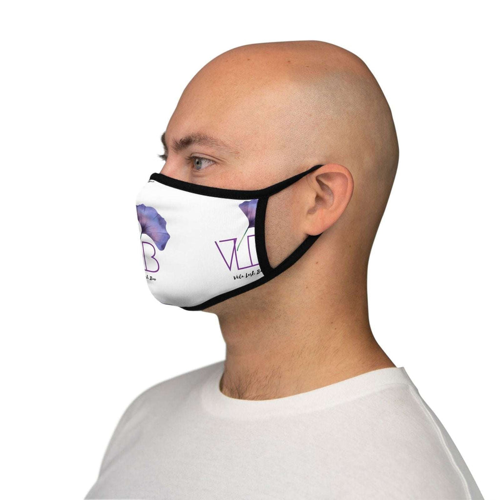 Comfortable face mask for beauty by Vela Lash Bar worn by a man with adjustable black straps