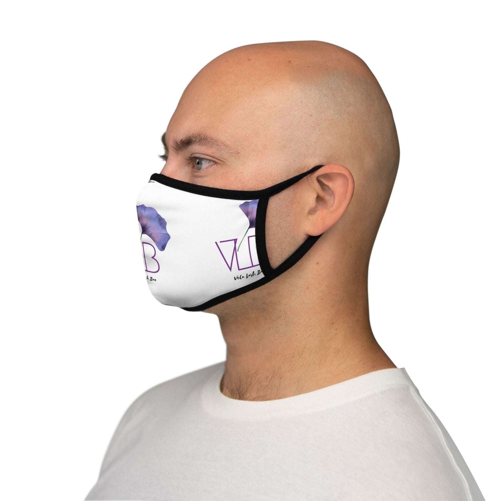 Comfortable face mask for beauty by Vela Lash Bar worn by a man with adjustable black straps