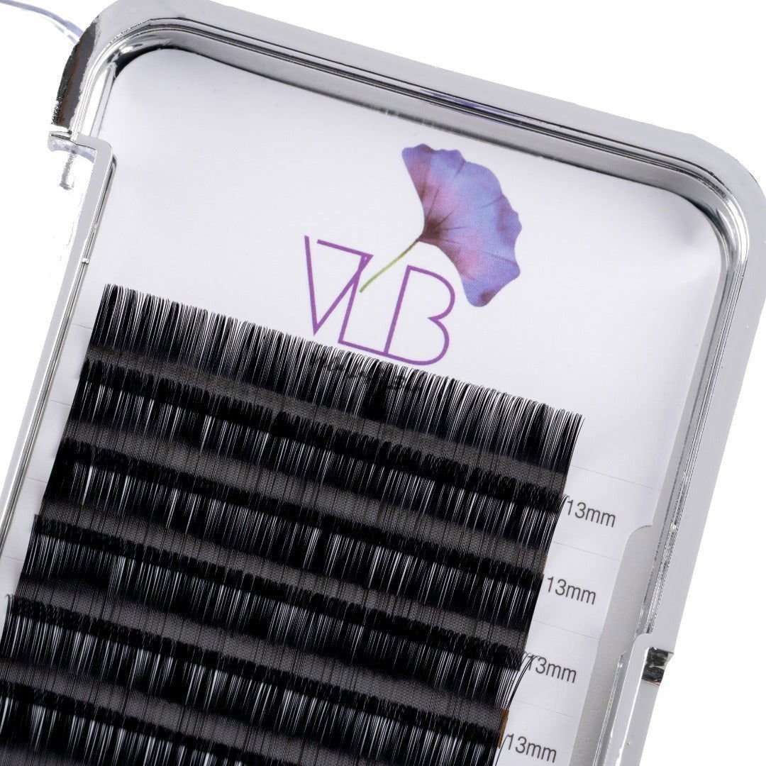 Vela Lash Bar D curl lash trays with black individual eyelashes in clear packaging