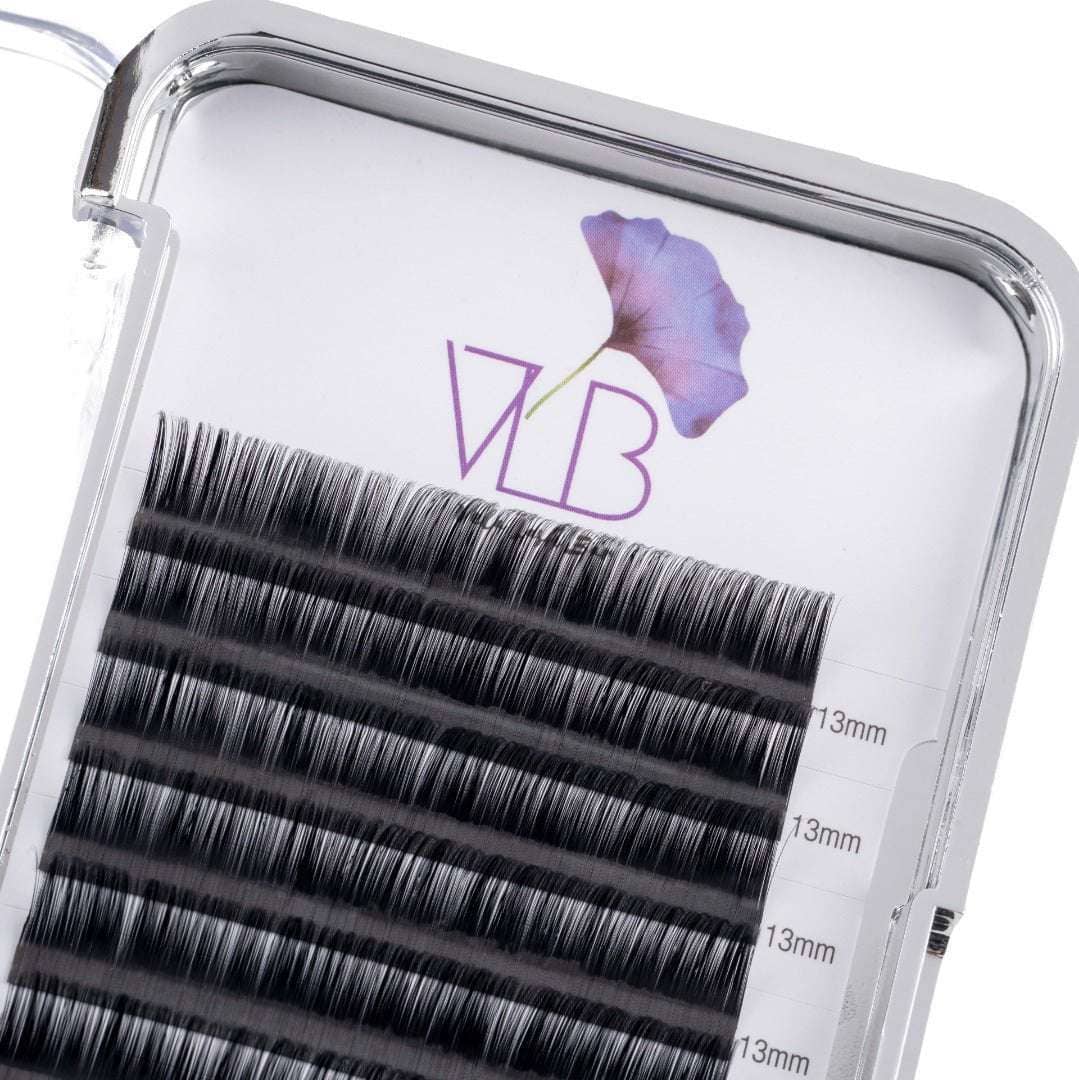Vela Lash Bar premium eyelash extension trays featuring various lengths for professional lash artists